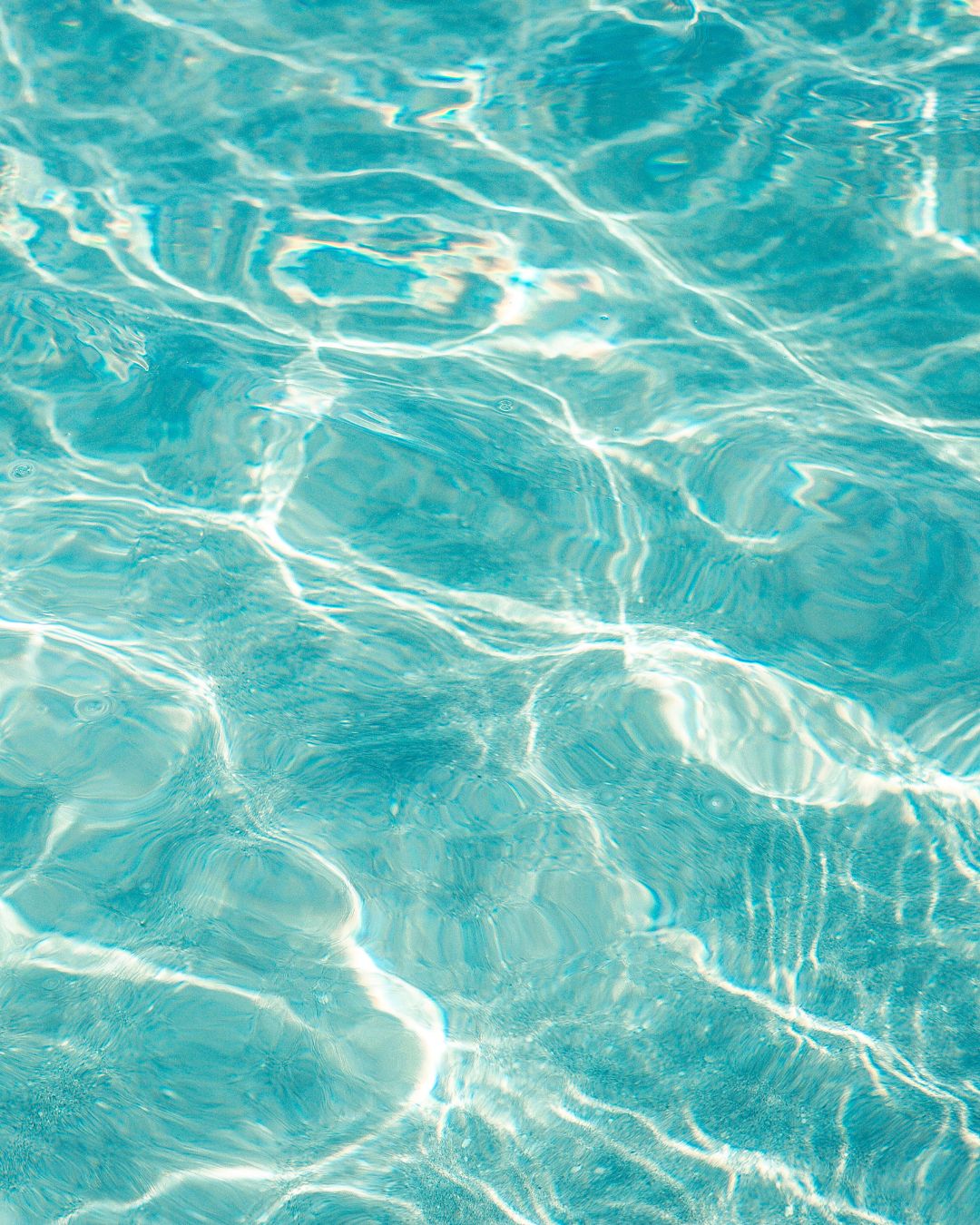 Clear blue water representing the effect of using a water softener